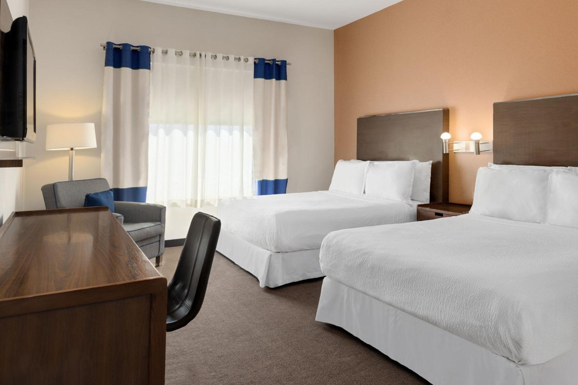 Four Points By Sheraton Galerias Monterrey Buitenkant foto A typical guest room at an extended stay hotel